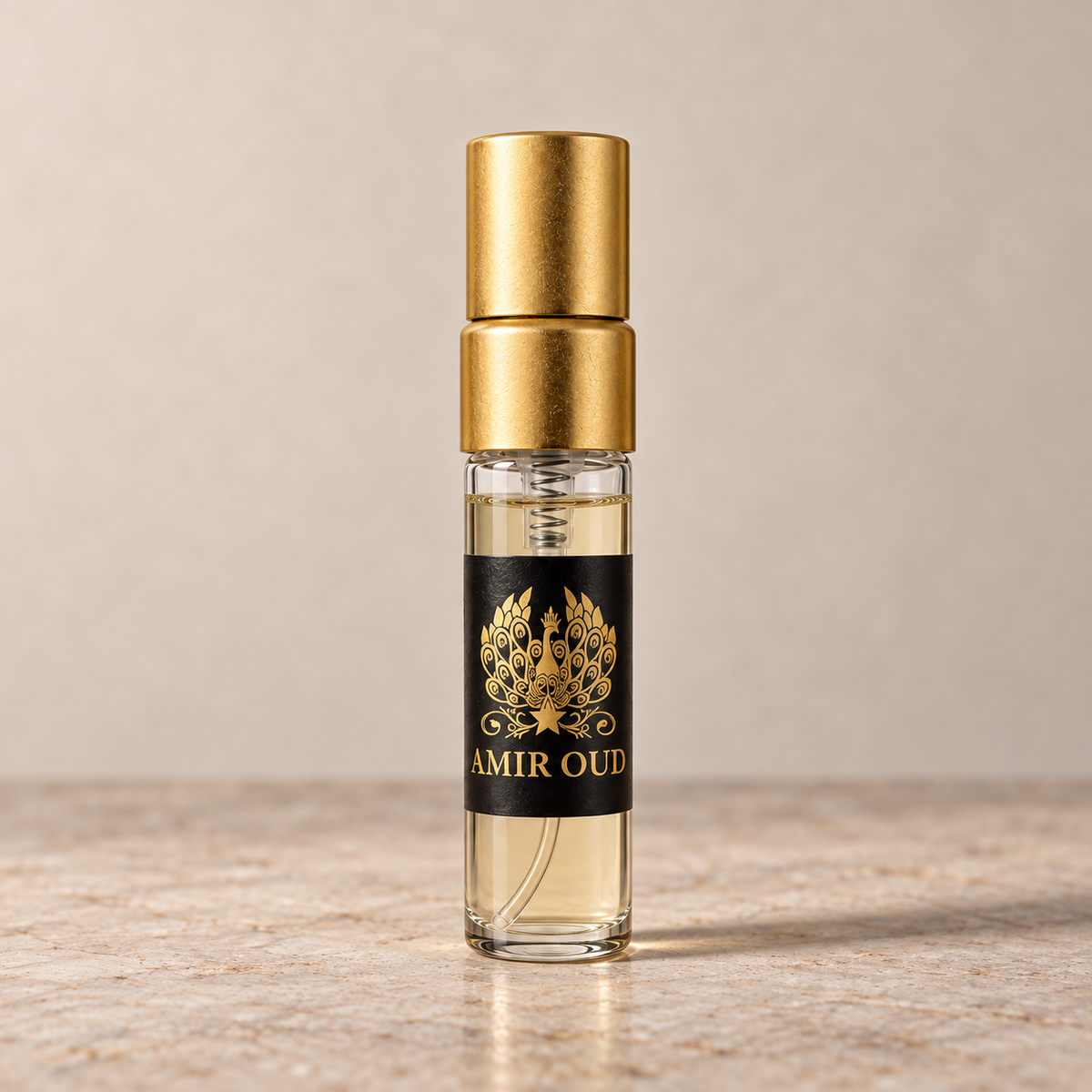 Amir Oud 3 ml spray sample filled with fragrance, satin gold cap and black branded label