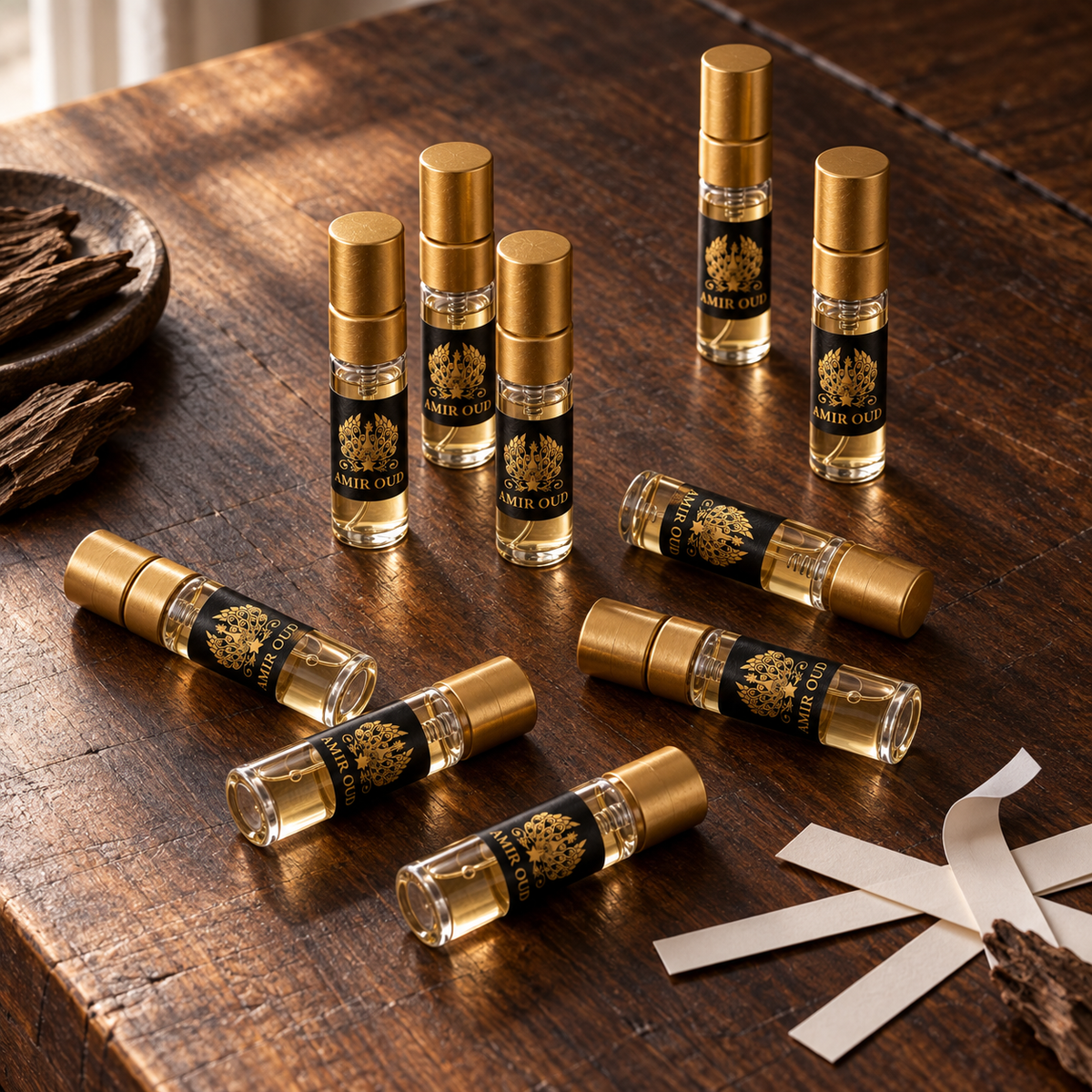 Amir Oud Oud perfume sample kit with ten filled 3 ml gold spray vials
